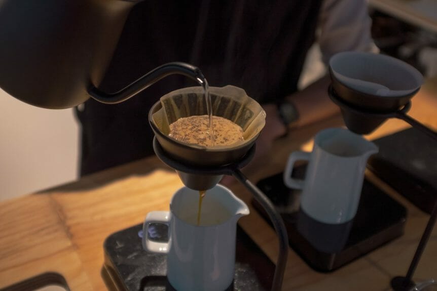 Barista pouring a V60 pour over at Glitch coffee in Tokyo.
