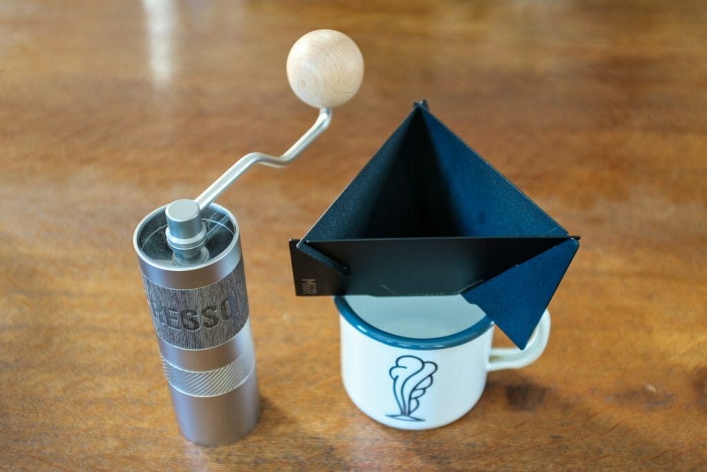 Miir Pourigami one a mug next to the 1Zpresso Q2 coffee grinder