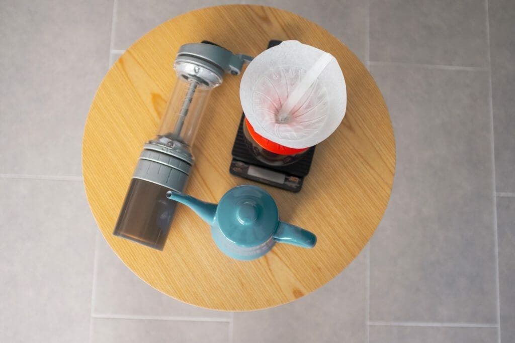 Hario V60 on a Brewista scale next to the Lido coffee grinder and Tsuki Usagi pouring kettle
