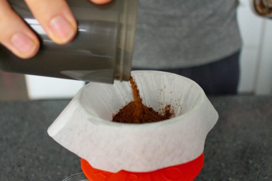 Pouring coffee in a V60 brewer